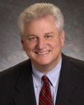  Mr. Glenn M. Karisch 